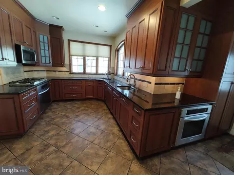 Kitchen - 3707 W Strathmore Ave, Baltimore, MD 21215 photo 12 of 12