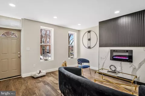 Living - 306 N Stricker St, Baltimore, MD 21223 photo 2 of 4