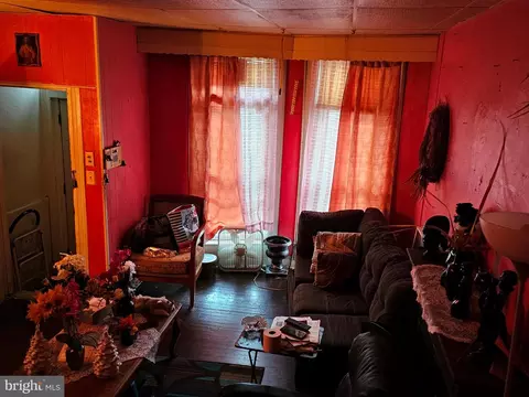 Living - 1817 Walbrook Ave, Baltimore, MD 21217 photo 2 of 6