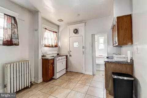 Kitchen - 824 Whitmore Ave, Baltimore, MD 21216 photo 2 of 3