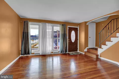 Living - 1242 Glenwood Ave, Baltimore, MD 21239 photo 1 of 2