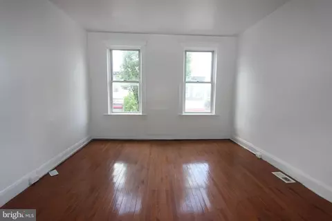 Living - 2335 E Monument St, Baltimore, MD 21205 photo 1 of 1