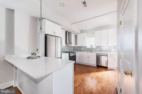 Kitchen - 1717 E Lafayette Ave, Baltimore, MD 21213 photo 1 of 4