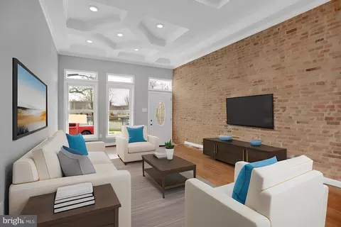 Living - 2406 N Calvert St, Baltimore, MD 21218 photo 3 of 4