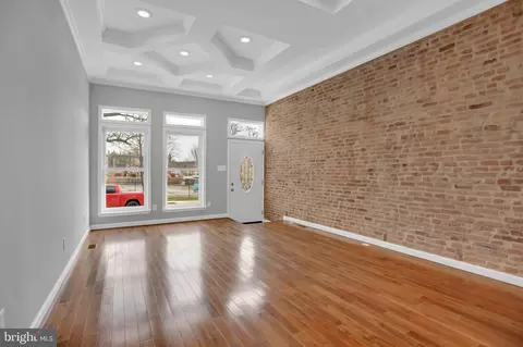 Living - 2406 N Calvert St, Baltimore, MD 21218 photo 2 of 4