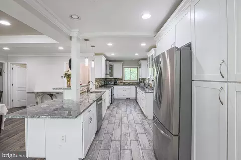 Kitchen - 2827 W Strathmore Ave, Baltimore, MD 21209 photo 1 of 10