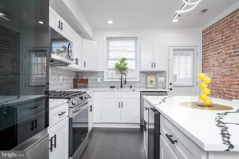 Kitchen - 229 S Robinson St, Baltimore, MD 21224 photo 4 of 11