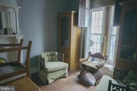 Living - 308 E 22nd St, Baltimore, MD 21218 photo 1 of 1