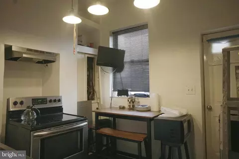 Kitchen - 308 E 22nd St, Baltimore, MD 21218 photo 2 of 3