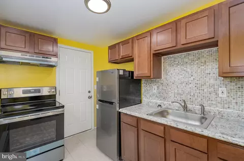 Kitchen - 419 E 31st St, Baltimore, MD 21218 photo 1 of 2