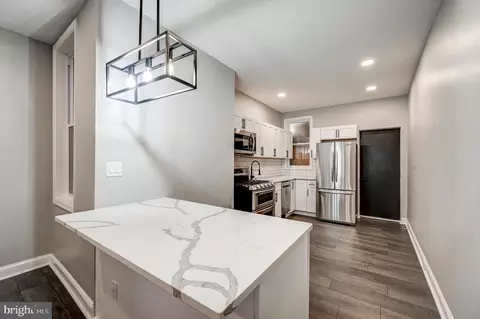 Kitchen - 305 S Mount St, Baltimore, MD 21223 photo 1 of 3