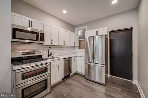 Kitchen - 305 S Mount St, Baltimore, MD 21223 photo 3 of 3
