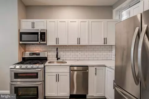 Kitchen - 305 S Mount St, Baltimore, MD 21223 photo 2 of 3