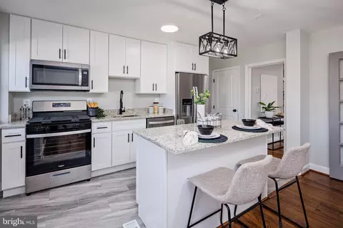 Kitchen - 3538 Elmora Ave, Baltimore, MD 21213 photo 5 of 6