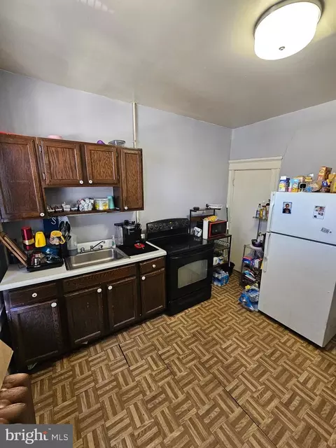 Kitchen - 207 W 29th St, Baltimore, MD 21211 photo 1 of 2