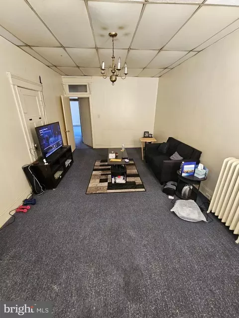 Living - 207 W 29th St, Baltimore, MD 21211 photo 3 of 3