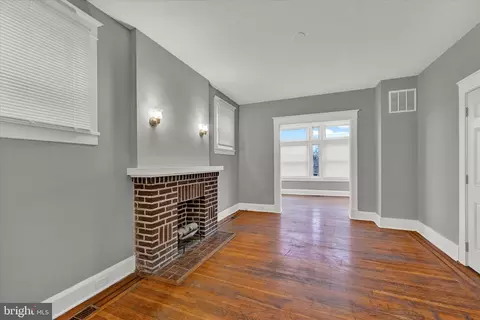 Living - 818 E 35th St, Baltimore, MD 21218 photo 2 of 4