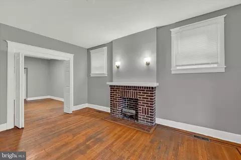 Living - 818 E 35th St, Baltimore, MD 21218 photo 1 of 4