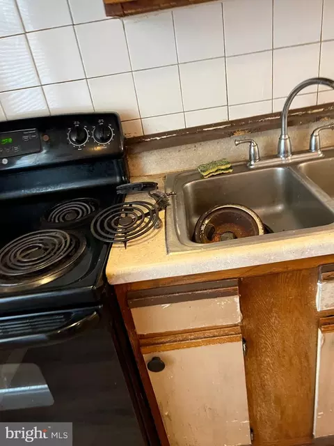 Kitchen - 642 E 29th St, Baltimore, MD 21218 photo 4 of 7