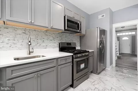 Kitchen - 1923 E 30th St, Baltimore, MD 21218 photo 1 of 2