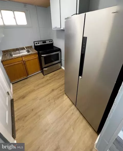 Kitchen - 514 S Payson St S, Baltimore, MD 21223 photo 1 of 2