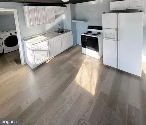 Kitchen - 514 S Payson St S, Baltimore, MD 21223 photo 2 of 2