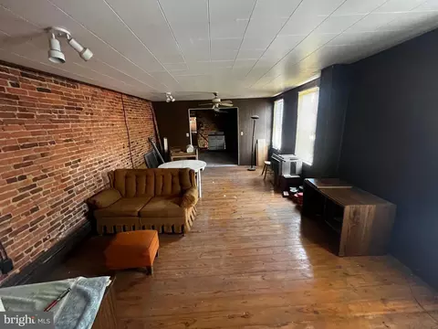 Living - 3001 E Baltimore St, Baltimore, MD 21224 photo 2 of 2