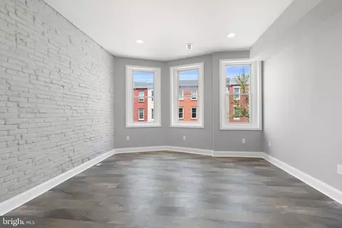 Living - 313 E 22nd St, Baltimore, MD 21218 photo 6 of 7