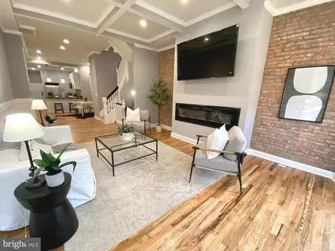 Living - 313 E 22nd St, Baltimore, MD 21218 photo 3 of 7