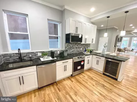 Kitchen - 313 E 22nd St, Baltimore, MD 21218 photo 2 of 2