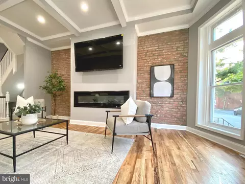 Living - 313 E 22nd St, Baltimore, MD 21218 photo 2 of 7