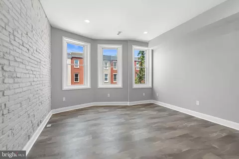 Living - 313 E 22nd St, Baltimore, MD 21218 photo 7 of 7