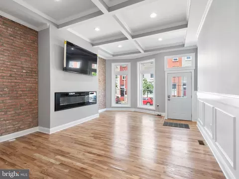 Living - 313 E 22nd St, Baltimore, MD 21218 photo 1 of 7