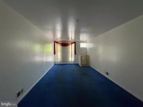 Living - 817 E Chase St, Baltimore, MD 21202 photo 1 of 3