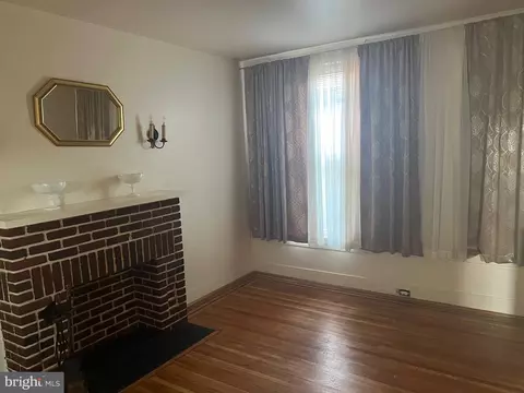 Living - 1820 E 32nd St, Baltimore, MD 21218 photo 1 of 3