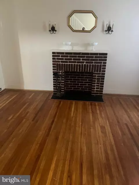 Living - 1820 E 32nd St, Baltimore, MD 21218 photo 2 of 3
