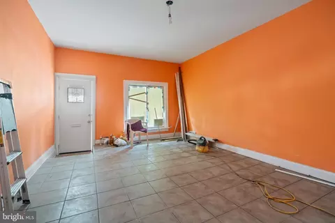 Living - 1702 N Wolfe St, Baltimore, MD 21213 photo 1 of 1