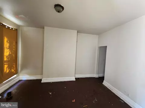 Living - 312 S Monroe St, Baltimore, MD 21223 photo 1 of 5