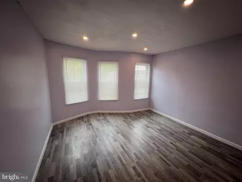 Living - 815 N Payson St, Baltimore, MD 21217 photo 1 of 1