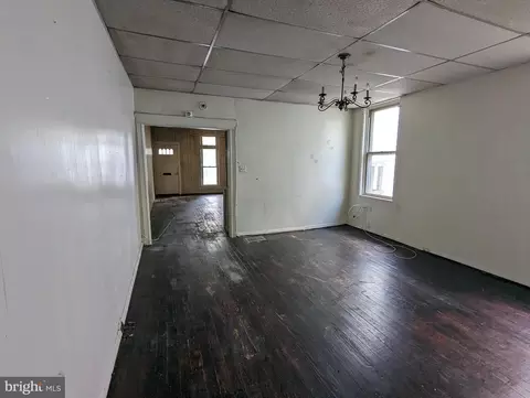 Living - 719 E 41st St, Baltimore, MD 21218 photo 3 of 4