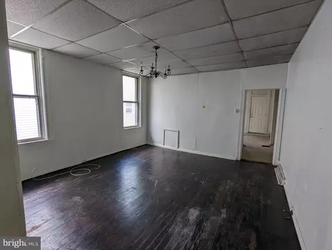 Living - 719 E 41st St, Baltimore, MD 21218 photo 2 of 4