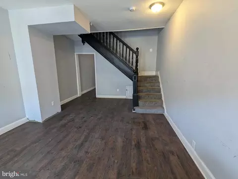 Living - 413 E 22nd St, Baltimore, MD 21218 photo 1 of 2