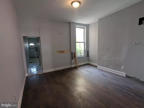 Living - 413 E 22nd St, Baltimore, MD 21218 photo 2 of 2