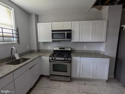 Kitchen - 413 E 22nd St, Baltimore, MD 21218 photo 1 of 1