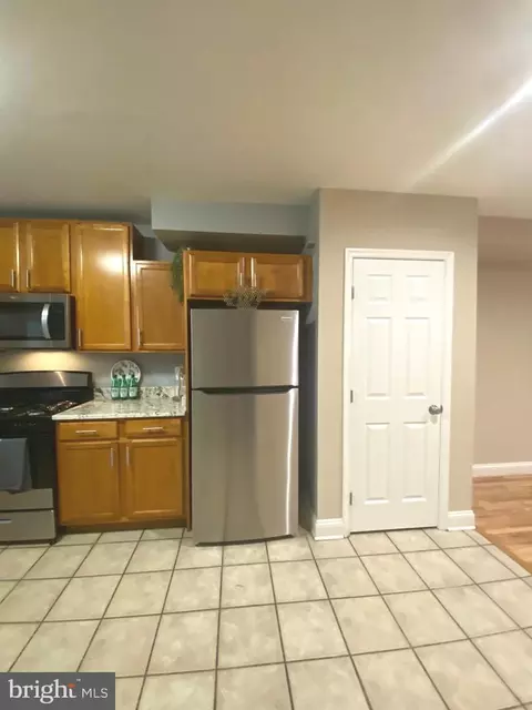 Kitchen - 3714 E Lombard St, Baltimore, MD 21224 photo 11 of 12