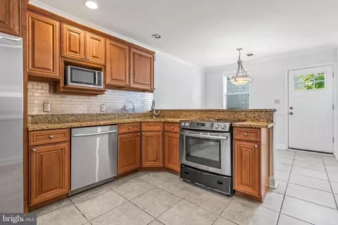 Kitchen - 312 S Regester St, Baltimore, MD 21231 photo 1 of 3