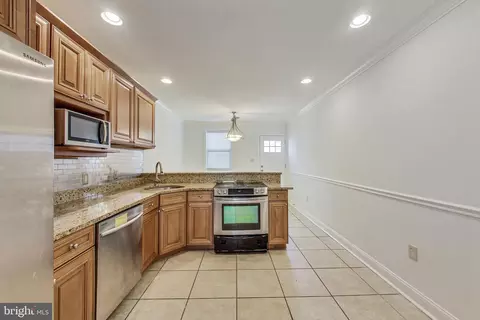 Kitchen - 312 S Regester St, Baltimore, MD 21231 photo 2 of 3