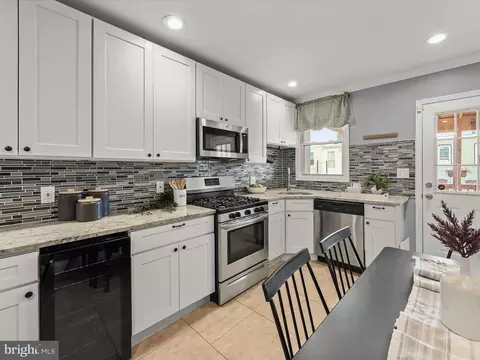 Kitchen - 233 N Milton Ave, Baltimore, MD 21224 photo 1 of 3