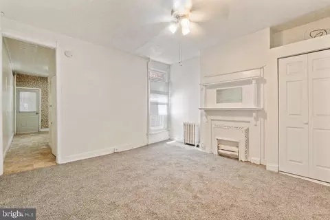 Living - 1 W 27th St, Baltimore, MD 21218 photo 2 of 3