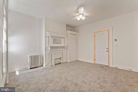 Living - 1 W 27th St, Baltimore, MD 21218 photo 1 of 3